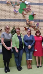 End of Life Coordinator Anne Hickey, Arts & Health Manager Alison Baker Kerrigan, artist Lucy Turner and former TUH CEO Lucy Nugent at the launch of the Butterfly Haven installation, a collaborative project remembering the lives if deceased TUH colleagues.